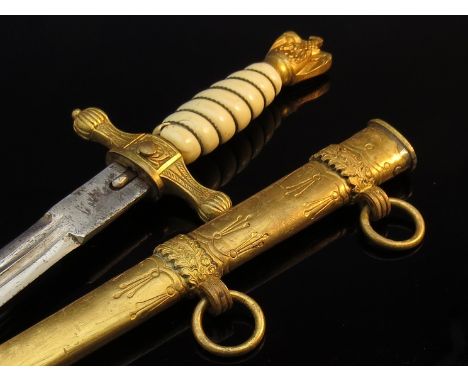 A German Third Reich era Naval Officer's dagger, gilt metal with ivorine grips, eagle pommel. Provenance available