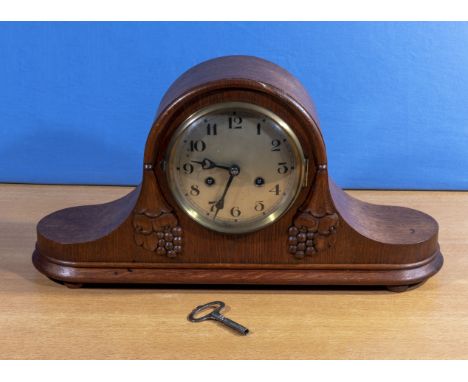 A Napoleon hat mantle clock.