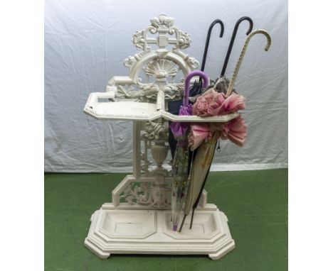 A Victorian white painted cast iron umbrella/stick stand