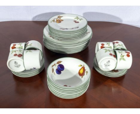 A Royal Worcester Evesham Vale eight piece dinner and tea service, unused boxed