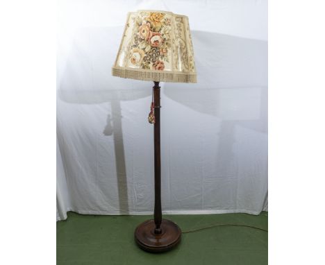 A standard lamp and shade.