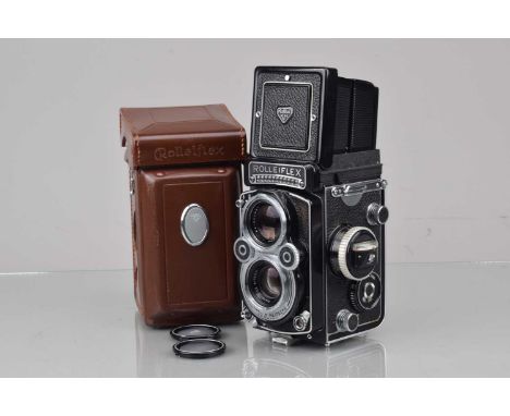 A Rolleiflex 3.5F TLR Camera, serial no 2231914, shutter working, light cell responsive, self timer working, body G-VG, some 