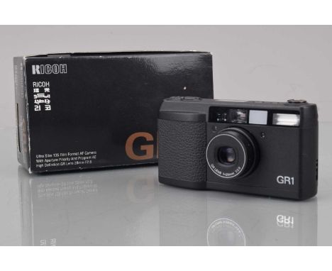 A Ricoh GR1 Date Compact Camera, black, shutter working, flash working, self timer working, top LCD panel not fully working, 