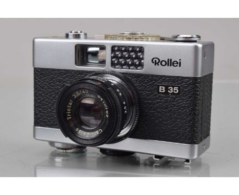 A Rollei B35 Compact Camera, made in Singapore, shutter working, light cell responsive, body G-VG, with Carl Zeiss 40mm f/3.5