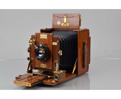 A Sanderson Half Plate Tropical Model Mahogany & Brass Camera, 3½ x 5¼'', body G-VG, some light marks, brass G, some tarnishi