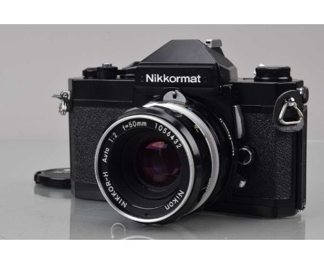 A Nikon Nikkormat FT2 SLR Camera, black, serial no 3560844, shutter working, meter responsive, self timer working, body G-VG,