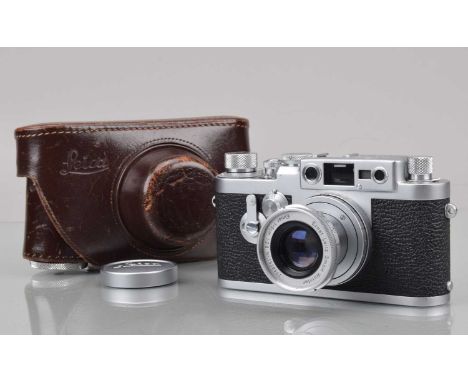 A Leitz Wetzlar Leica IIIg Rangefinder Camera, serial no 903990, 1957, shutter working, occasionally sluggish in fast speeds,