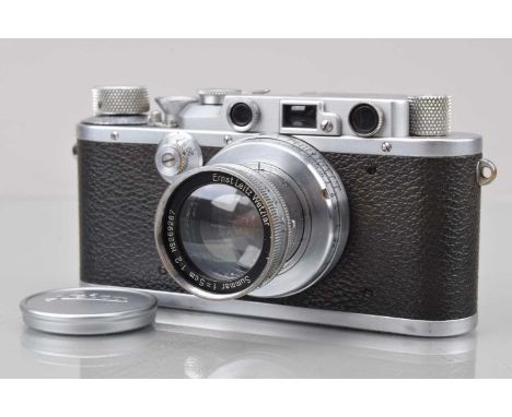 A Leitz Wetzlar Leica III Rangefinder Camera, serial no 198342, 1936, shutter working, rangefinder working, body G, some ligh