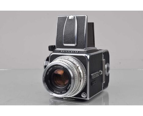A Hasselblad 500 C Camera, chrome, serial no UH 12691, shutter working, body G-VG, with Carl Zeiss 80mm f/2.8 Plannar C lens,