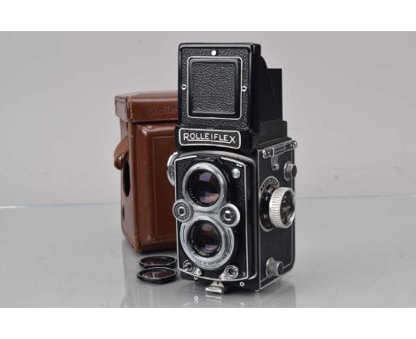 A Rolleiflex MX-EVS TLR Camera, type 2, serial no 1717186, shutter sluggish in slow speeds, self timer stutters/sticking, bod