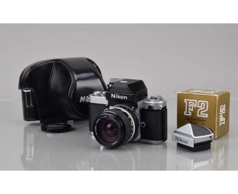 A Nikon F2A SLR Camera, chrome, serial no 7236100, shutter working, DP-11 finder responsive, self timer working, body VG, wit