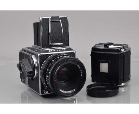 A Hasselblad 501C/M Camera, chrome, serial no 10SS23342, shutter working, body G-VG, some lifting to leatherette on L/H side,