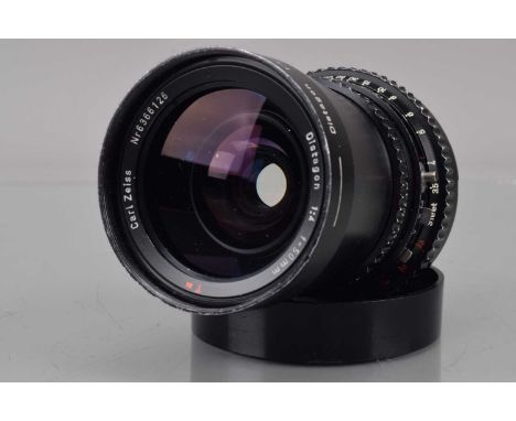 A Hasselblad Carl Zeiss T* 50mm f/4 Distagon C Lens, black, serial no 6366125, shutter working, barrel F-G, some paint wear, 