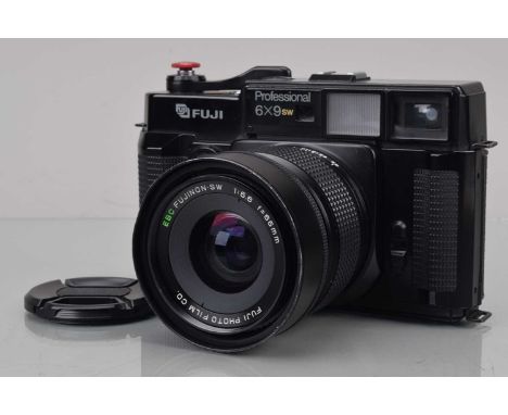 A Fuji GSW690 II Professional 6x9 SW Camera, serial no 6020051, shutter working, rangefinder working, body G, some paint wear