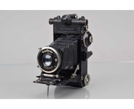 A Voigtländer Prominent 6 x 9cm 1933 Folding Rangefinder Camera, serial no D 965338, Compur shutter working, rangefinder work
