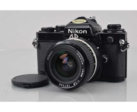 A Nikon FE SLR Camera, black, serial no 6157218, shutter working, meter responsive, responsive in auto, self timer working, b