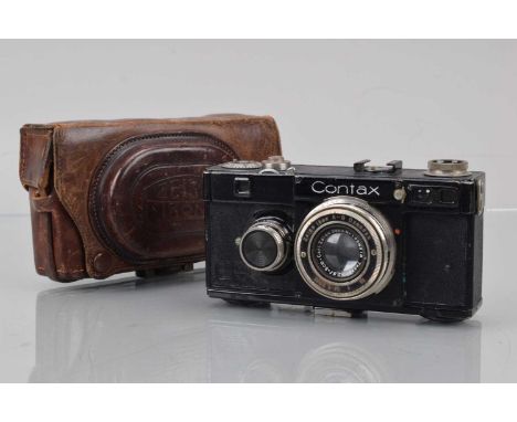 A Zeiss Ikon Contax Ic Rangefinder Camera, serial no V94640, shutter working/sluggish, rangefinder functions, body F-G, some 