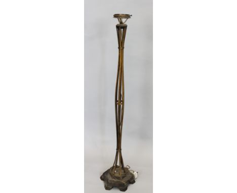 An Art Deco style standard lamp, with shaped slatted supports, and a hexagonal ebonised base, incomplete, 112cm high.