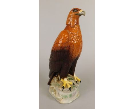 A Beswick Golden Eagle decanter, modelled by J.G. Tongue 1969, cork stopper, 28cm high