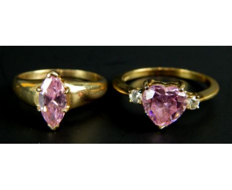 Two dress rings, a 9ct gold pink stone set ring and a silver gilt dress ring. 