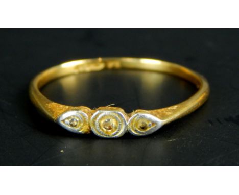 A Victorian dress ring, set with three illusion set tiny diamonds, yellow metal, marked 18ct, 1.3g all in. 