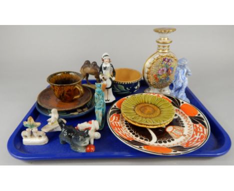 A collection of Continental pottery and porcelain, to include a Dutch Petrus commemorative plate for 1898, a French maid hour
