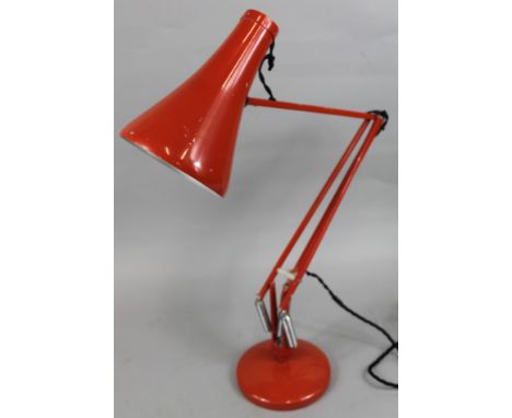 A 1970's/80's red angle poise retro style lamp.