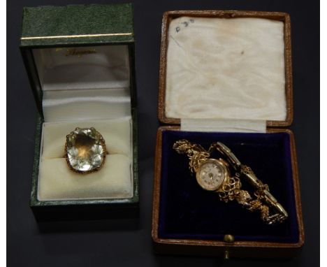 Two items of jewellery, to include a 9ct gold citrine dress ring, and a rolled gold watch (2). 