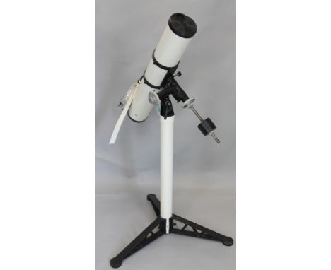 A modern telescope made by WPZ, with adjustable tripod stand, instructions, etc.
