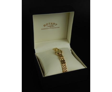 A Rotary ladies wristwatch, on stainless steel, gold plated design bracelet, boxed. 