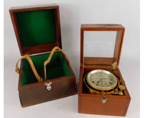 A marine chronometer by Thomas Mercer, with silvered dial stamped Thomas Mercer Ltd, St Albans, England, in a mahogany case a