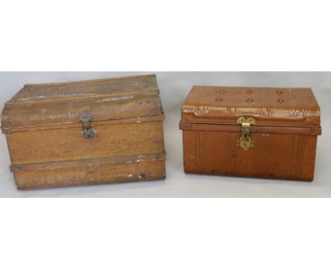 Two similar early 20thC vintage style tin trunks,  each with painted woodgrain, one labelled for Jones Brothers and Co. Wolve