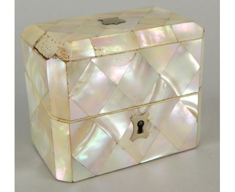 A Victorian mother of pearl dressing box, containing a pair of glass scent bottles, each with a silver plated lid, 10cm wide.