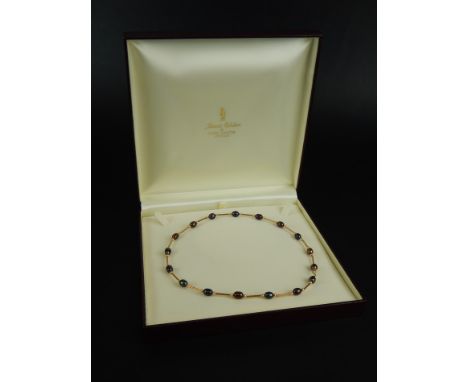 A 9ct gold James Usher cultured pearl necklace, with seventeen pearls, boxed. 