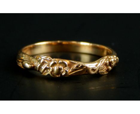 A dress ring, with floral design, yellow metal, unmarked, 1.6g.