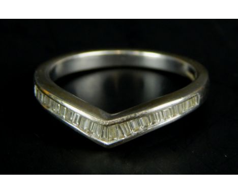 An 18ct white gold wishbone ring, set with baguette cut diamonds, 3.4g all in. 