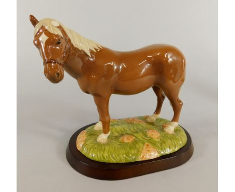 A Royal Doulton porcelain model of My First Pony, RDA34, boxed and certificate (AF).