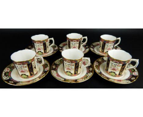 A set of six Royal Crown Derby Chelsea Garden pattern cups and saucers, with red stamped dated 1997.