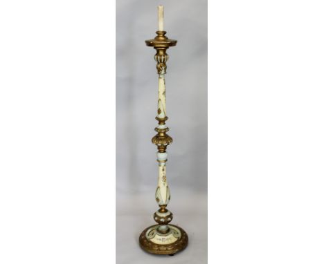 A Continental polychrome and gilt painted standard lamp, on a shaped foot, 145cm high.