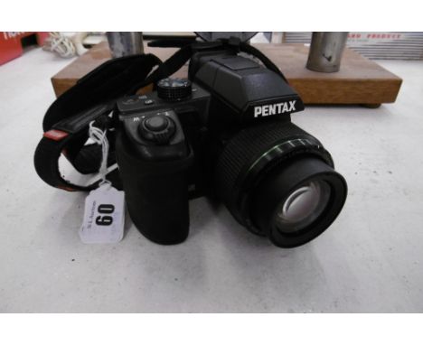 A PENTAX X5 16 MPX DIGITAL CAMERA
