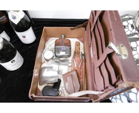 A SMALL LEATHER CASE INCLUDING HIP FLASK AND COMPASS