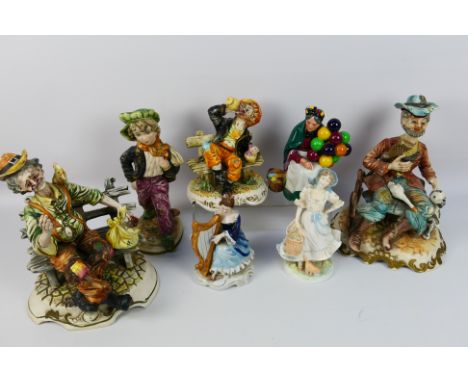 A collection of ceramic figures to include a Royal Worcester limited edition The Milkmaid, Royal Doulton The Old Balloon Sell