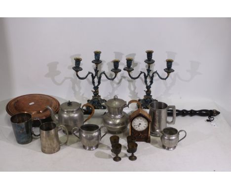 A mixed lot of predominantly metal ware. Lot includes 2 x brass  lamp stands. Pewter mugs, and tea pots. Copper bed warmer. 4