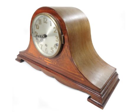 An early 20thC mahogany and boxwood strung Napoleon hat mantel clock, the 14cm Dia. Arabic dial with three winding holes reve