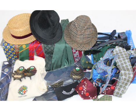 A tin case, of rectangular form, 57cm W, containing a quantity of various ties, bowls related, other clothing, further ties, 