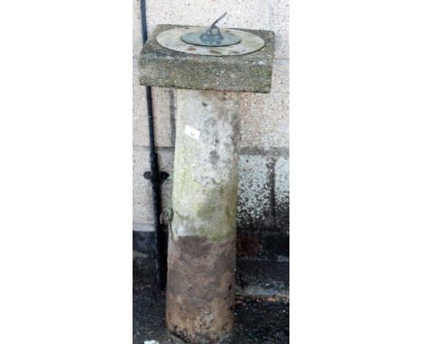 A 20thC stone garden sundial, the square top with metal centre plate, on cyclindrical stem, 84cm H.From the estate of R J 'Bo