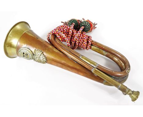 A Royal Welsh Fusiliers insignia mounted brass and copper bugle, 31cm H.