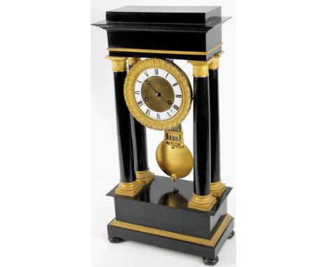 A 19thC French ebonised and ormolu mounted portico clock, with eight day movement, 69cm H.