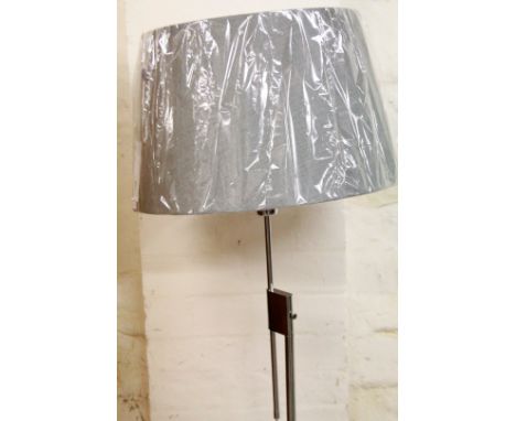 *An as new electrical Oaks Lighting standard lamp, with cylindrical stem, shaped foot and textured shade in grey, 162cm H.