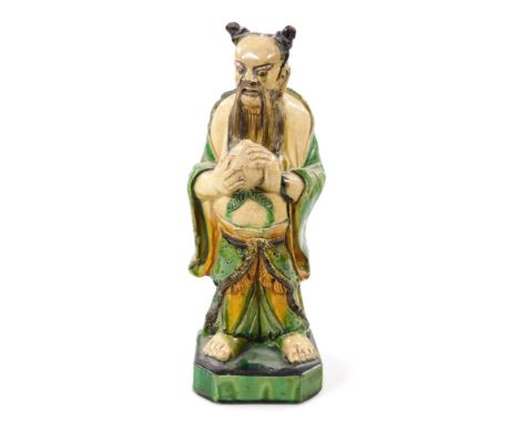 Two similar Chinese T'ang style terracotta pottery figures, of a bearded sage in flowing robes holding orb, predominately in 